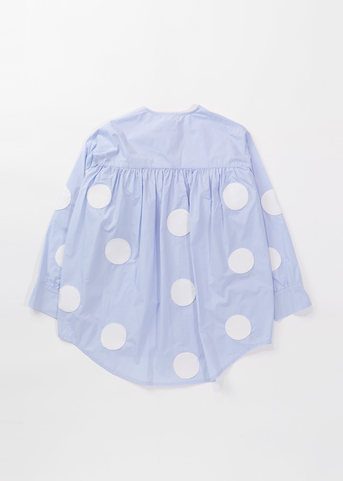 Polka dots on sleeve blouse with ruffles